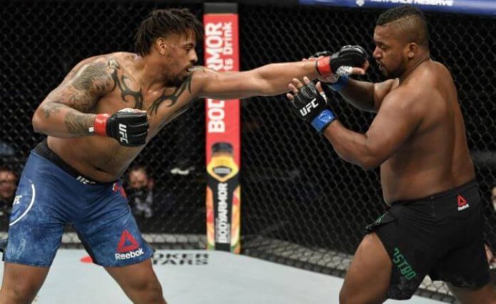 Greg Hardy Wins UFC Bout With an Assist from Coronavirus, Daniel Cormier