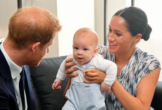 Harry and Meghan with their son Archie